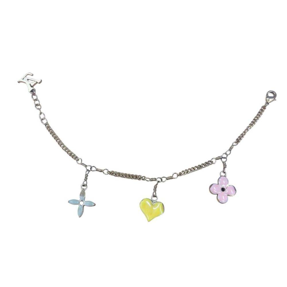LOUIS VUITTON Gold Monogram Charm Bracelet - Picture 4 of 6